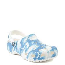 The clog is the company's first shoe, recognized by its choice of bright colors and soft material. Crocs Classic Clog Clouds Journeys