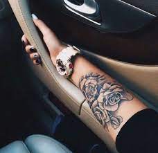 Ruby rose has got a pattern of cherry blossom, waves, and tiger inked on the inner portion of her right arm. Roses Arm Tattoo Tattoos Rose Tattoo On Arm Girly Tattoos