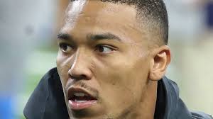 Amon-Ra St. Brown vibing with Jared Goff