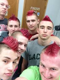 Laconia wrestlers sport daring 'dos in cancer fight