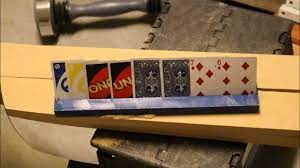 To do this, take a piece of black yarn 4 inches long, and poke your needle with the yarn through the center of the top circle into the bottom circle. Playing Card Holders Craft Dad Youtube