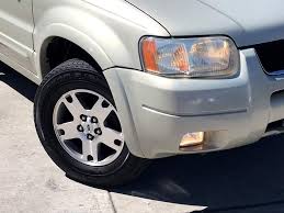 Image result for Gold Ash 2004 Escape