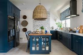 See The Transformation Of Hgtv S Bungalow Escape In A Series Of Photos We Capture The Dramat Blue Kitchen Cabinets Open Concept Kitchen Kitchen Cabinet Colors