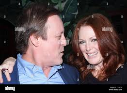 Patrick McMullan and Julianne Moore A private dinner celebrating Paper  Magazine's cover of Julianne Moore at Indochine New York Stock Photo