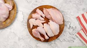 Cut off the chicken breasts. 5 Ways To Cut Up A Whole Chicken Wikihow