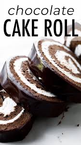Fudgy Rich And Decadent Homemade Chocolate Swiss Roll Cake Made With Chocolate Sponge Cake Sweet Vanilla Whi Chocolate Roll Cake Cake Roll Recipes Cake Roll