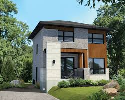 Le Mariage De La Pierre De La Brique Du Bois Et De L Aluminium De Cette Jolie Maison A Etage Est Contemporary House Plans Small Modern Home Two Storey House