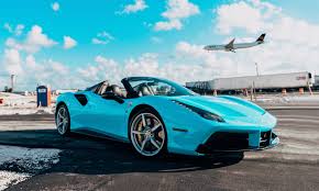Tour our new showroom to fully experience. 2018 Ferrari 488 Spider Tiffany Blue Mvp Miami Exotic Rentals