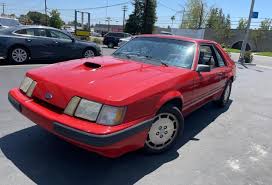 Image result for Medium Canyon Red 1985 Mustang