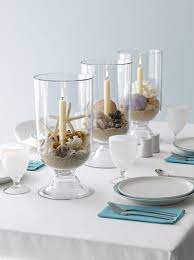 Beach home decor, beach home accents, starfish on stand, starfish decor, starfish, beach wedding decor, beach table decor, coastal decor. 20 Festive Coastal Table Top Centerpiece Ideas With Candles Coastal Decor Ideas Interior Design Diy Shopping