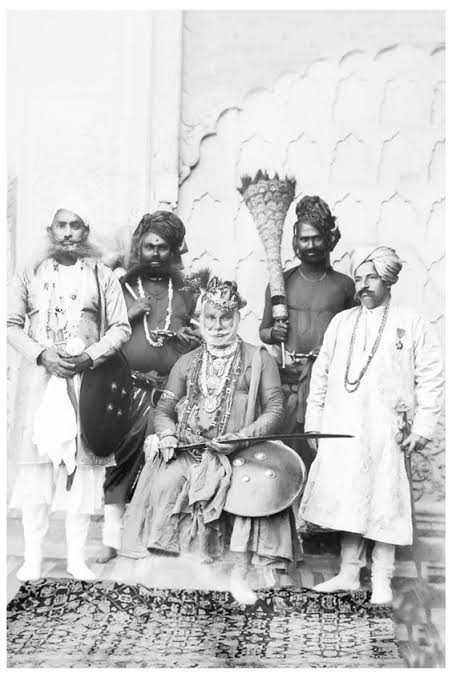 Rajput men playing the game of Pachisi
