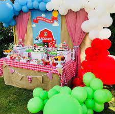 What a fun farm party with a petting zoo and a barn themed dessert table! Farm Themed Dessert Table From A Barnyard Farm Birthday Party On Kara S Party Ideas Karaspar Barnyard Birthday Party Farm Themed Birthday Party Farm Birthday
