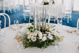15 Candle Centerpieces That Will Light Up Your Reception Weddingtopia Round Wedding Tables Candle Table Centerpieces Cheap Wedding Centerpieces