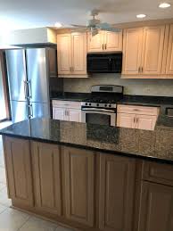 White shades range from dark to light. Beautfiul Light Wood Custom Full Kitchen Complete Liebherr Stainless Steel Refrigerator Range Appliances Little Green Kitchens
