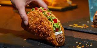 Taco Bell S New Toasted Cheddar Chalupa Has Cheese Baked Into Shell