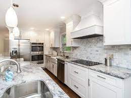 This is an incredible current case of a white kitchen, including a light cream mosaic backsplash. 30 Beautiful White Kitchens Design Ideas Backsplash Kitchen White Cabinets Marble Countertops Kitchen White Kitchen Design
