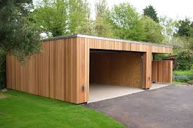 By Ecospace Espana Modern Wood Wood Effect House Exterior Modern Garage Garden Buildings