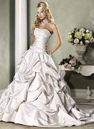 Strapless bodice detailed with silver bugle beads at the neckline and droppedwaistline. Amazing Ruffle Wedding Dress Wedding Dresses Wedding Dresses Satin