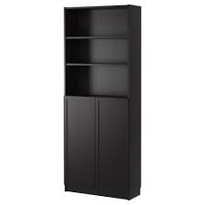 Black Billy Bookcase With Doors Ikea Us Furniture And Home Furnishings Billy Bookcase Billy Bookcase With Doors Bookcase
