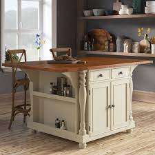 The rough sawn hardwood top is paired with a painted brown maple base in a vintage pearl finish, making this island a handsome and durable. Extendable Kitchen Islands Carts You Ll Love In 2021 Wayfair