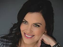 Former undercover CIA agent Michele Assad speaking at Cocoa Beach Library