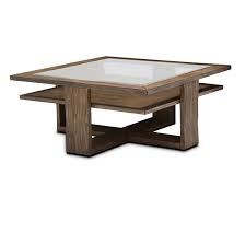 A vintage golden pine finish combines with aged bronze hardware to create a beautiful weathered appearance that works in a variety of settings. Michael Amini Kathy Ireland Home Designs Del Mar Sound Cocktail Table In Square Wayfair