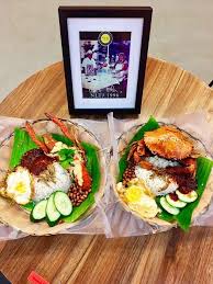 Fancy some lobster with your plate of nasi lemak? Reward Yourself With Luscious Lobster And Crab Nasi Lemak Available At Very Affordable Amount Klnow