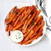 Isaac's carrot cake topped with frosting and carrot design. Https Encrypted Tbn0 Gstatic Com Images Q Tbn And9gcq5lyi2bszqooksbdlxjl6lh12tdlnqdmp 0ke1dkq2qufxddd5 Usqp Cau