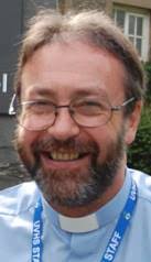 Only became a vicar this year, now a canon. Fast tracked Dennis Coburn