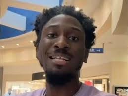 Black rights campaigner grabbed by security and falsely accused of theft