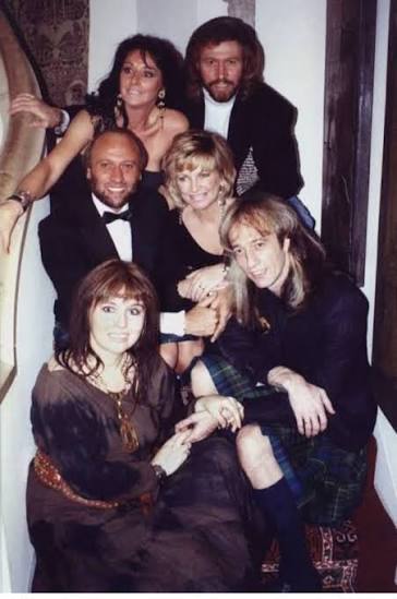fblifestyle Bee Gees, along with their wives The Bee Gees were a popular  music group consisting of the three brothers: Barry, Robin, and Maurice  Gibb. The group was formed in 1958 and