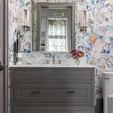 Pair a gray rug with gray shower tiles, and use a white towel to echo the white marble on your bathroom counters. Huurjh0fnsl1dm