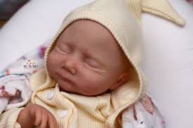 So one of the coolest things ever is that I get to paint this extremely  rare little face. "Lily" by Denise Farmer, produced in 2007! :O (6 years  before I started reborning).