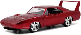Dom's signature car in the fast saga is the black 1970 dodge charger r/t. Amazon Com Jada Toys Fast Furious Dom S Dodge Charger Daytona Die Cast Car 1 24 Scale Red 97060 Toys Games