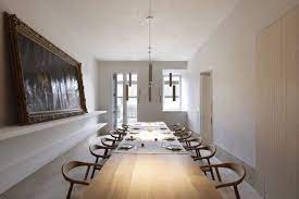 in the dining room a custom 20 foot long oak dining table from carl hansen seats 20 hotels design santa clara home