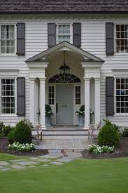 White House With Gray Shutters And Blue Door Novocom Top