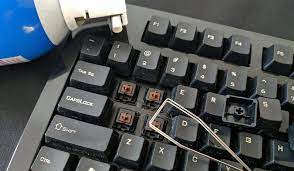Shake keyboard if you're cleaning a laptop keyboard to help keep it clean, wash your hands before each use and never eat or drink while typing. How To Clean Your Keyboard Without Breaking Anything