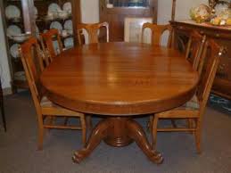 Mahogany duncan phyfe style dining room table with extensions and brass claw feet. Antique Claw Foot Tables Lovetoknow