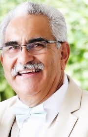 E Ricky “Coach” Brooks (1954-2018)