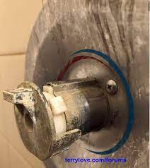 I recently removed a moen kitchen faucet for a customer, and yes, you do need to remove the retainer nut underneath. Moen Posi Temp Stuck Shower Handle Adapter Terry Love Plumbing Advice Remodel Diy Professional Forum