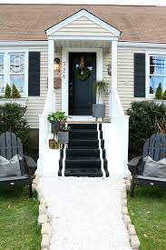 Thinking of having it painted vs stained, gray floor and white rails. Front Porch Spring Reveal With Painted Steps Nesting With Grace