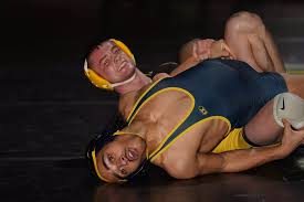 Tanner Smith Flips Over Albion to Lead Mens Wrestling to MIAA Victory -  Adrian College