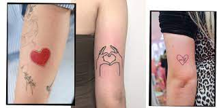 Small anchor tattoo on the neck. Heart Tattoos 14 Heart Tattoo Designs To Inspire Your Next Ink