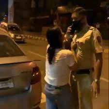 police officer: Drunk girl abuses police officer, video goes viral on  Twitter - The Economic Times