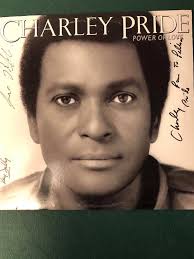Charley Pride Concert, 1976 “Pride favorites wow 6,000 fans By Michael  Rogers, Herald Staff Writer Charles Pride really wowed 'em Thursday night  at the Sportsplex. Close to 6,000 dedicated fans of Charley