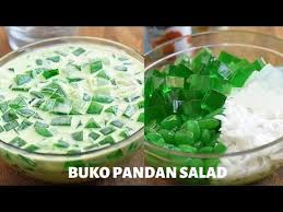 Buko Pandan Salad Made With Gulaman And Young Coconut In Sweetened Cream Rich Creamy And With Pan Filipino Desserts Buko Pandan Recipe Filipino Food Dessert