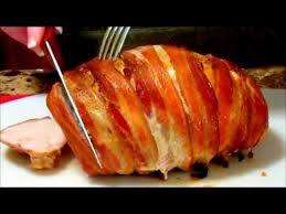 Place turkey on a roasting rack and place roasting rack in a large baking dish. Bacon Wrapped Turkey Breast With Truffle Butter Infusion Youtube