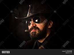 A mysterious preacher (clint eastwood) protects a humble prospector village from a greedy mining. Portrait Elegant Man Image Photo Free Trial Bigstock