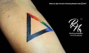 Rainbow Triangle Tattoo Triangle Can Also Symbolize Creativity As Good And Positive Thing Though Rainbow Tattoos Triangle Tattoos Triangle Tattoo Geometric