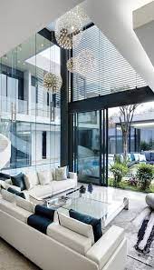 The house creates a simple glazed living space that opens up to become a front porch to the beautiful hood canal. Glass House Living Room Design Modern Modern Interior Design House Design